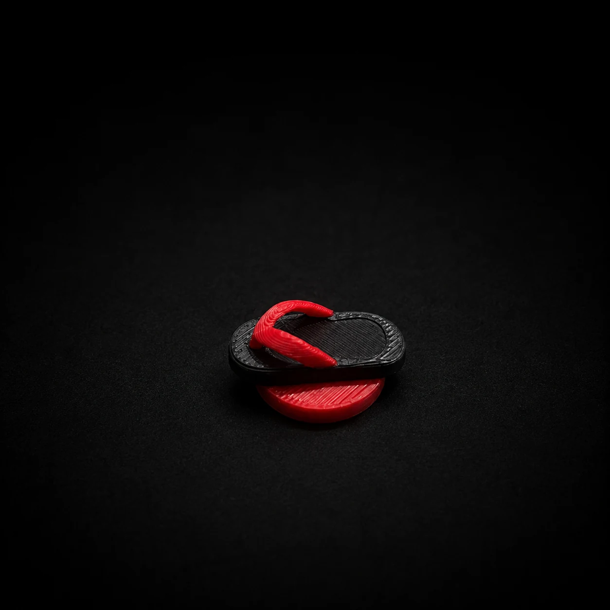 3D printed chancla game piece